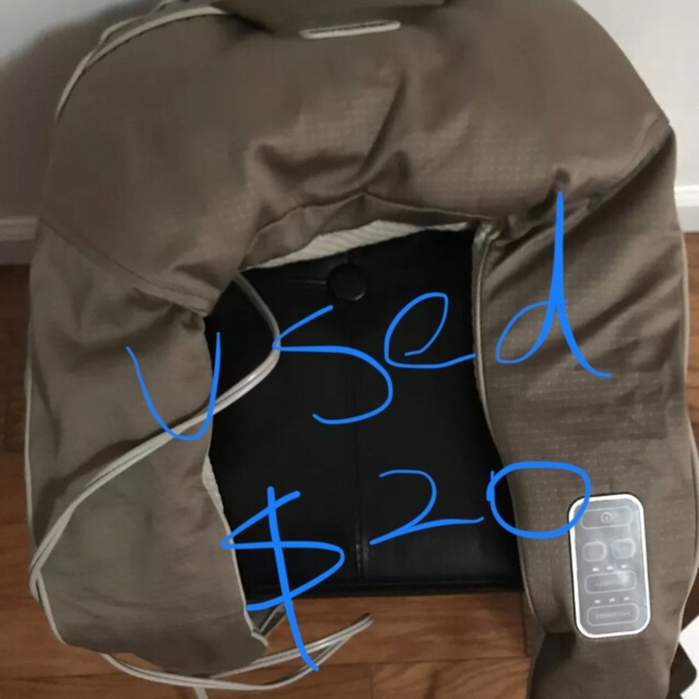 Used neck massager